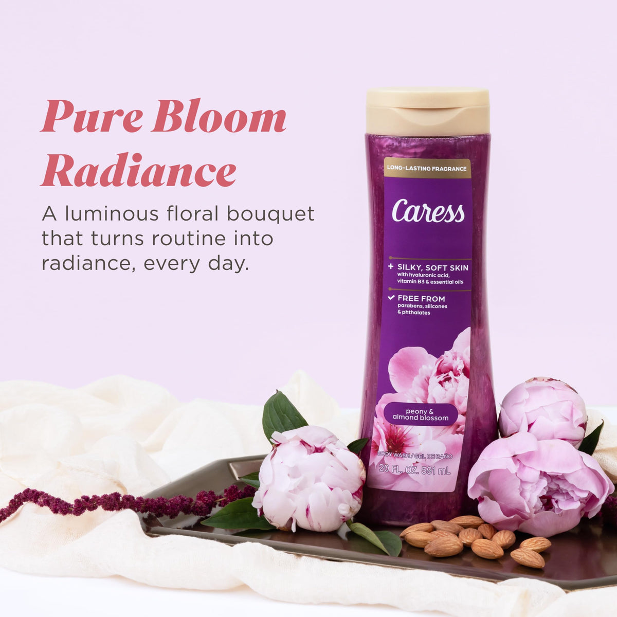 Four-pack of Caress bottles on bathroom shelf showing value and convenient storage