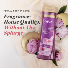 Caress rich lather close-up showing creamy foam that hydrates and softens skin