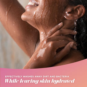 Caress bottle in bathroom lifestyle scene suggesting relaxing, fragrant shower experience