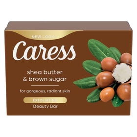 Caress bars arranged on shower shelf lifestyle scene suggesting indulgent everyday bathing