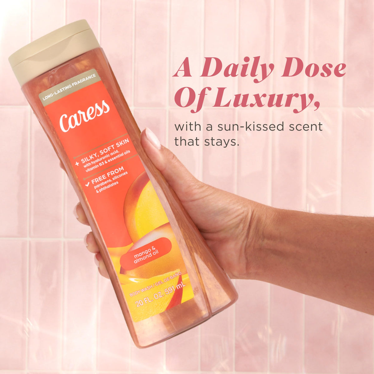 Person using Caress body wash in the shower for fragranced cleanse