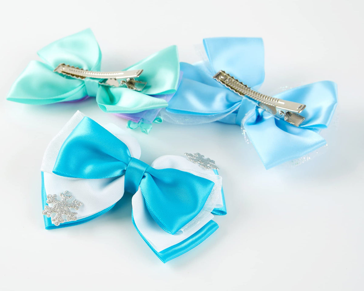 Carkno bows placed next to ruler showing approximate 4x3 inch size