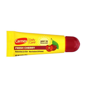 Carmex tube held in hand for size comparison and portability