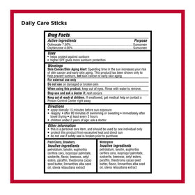 Carmex pack on a beach towel lifestyle image showing outdoor readiness