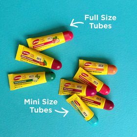 Close-up of Carmex balm texture showing smooth moisturizing finish