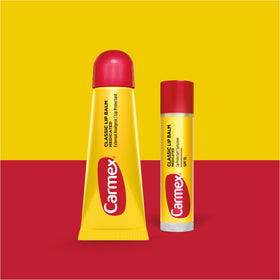 Carmex tub open texture visible, brand soothing moisture benefit