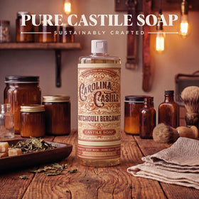 Carolina Castile Soap next to a ruler for size comparison and concentrated bottle value