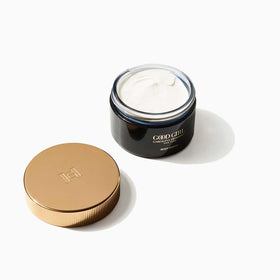 Carolina Herrera Good Girl cream on hand demonstrating smooth application and softening benefit