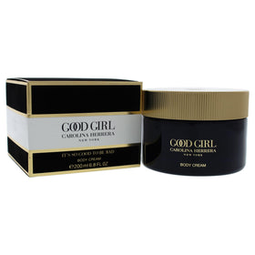 Carolina Herrera Good Girl jar held in hand showing size and travel-friendly benefit