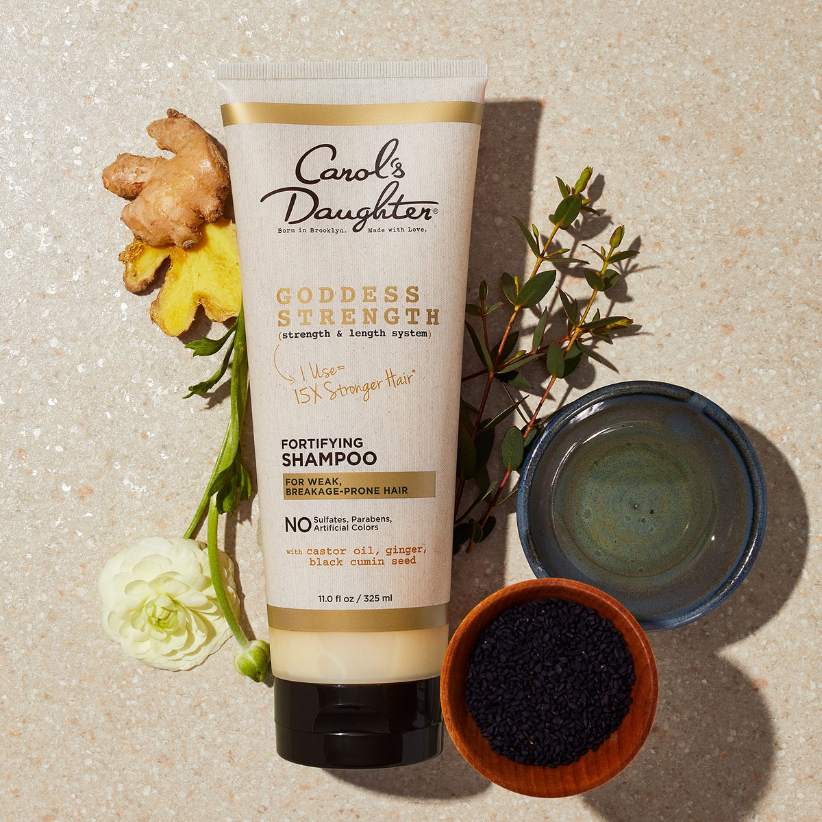Carol's Daughter raw ingredients black cumin seed and castor oil focus