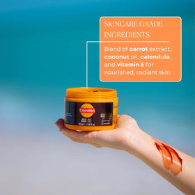 Carroten carrot and coconut ingredients display illustrating natural oil nourishment