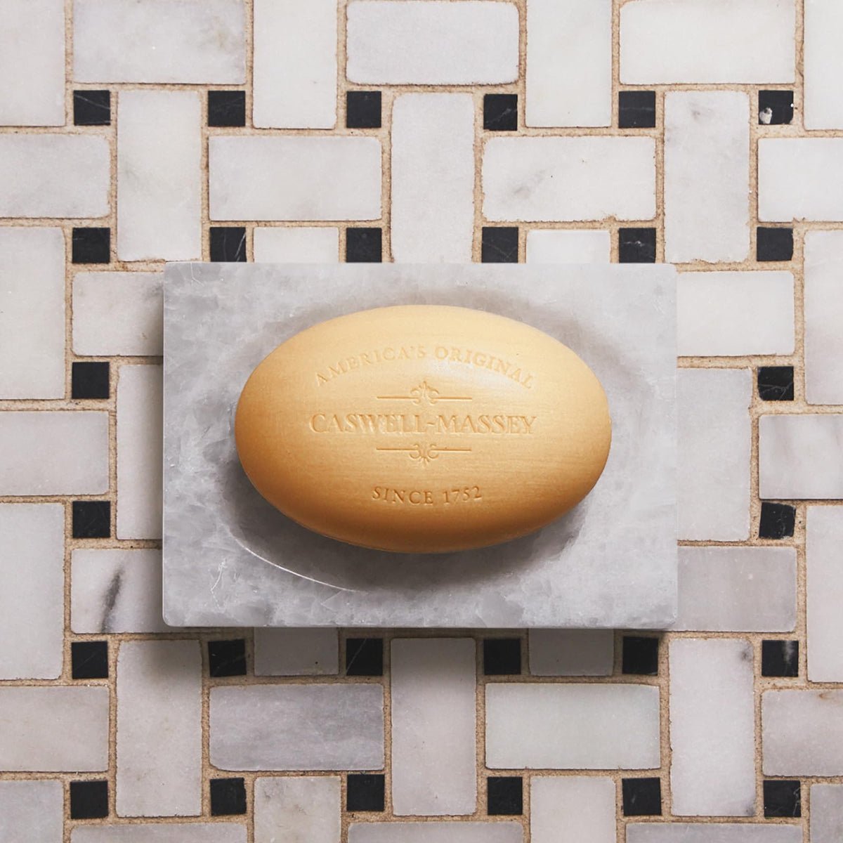 Caswell-Massey packaging label with scent details and artisanal branding