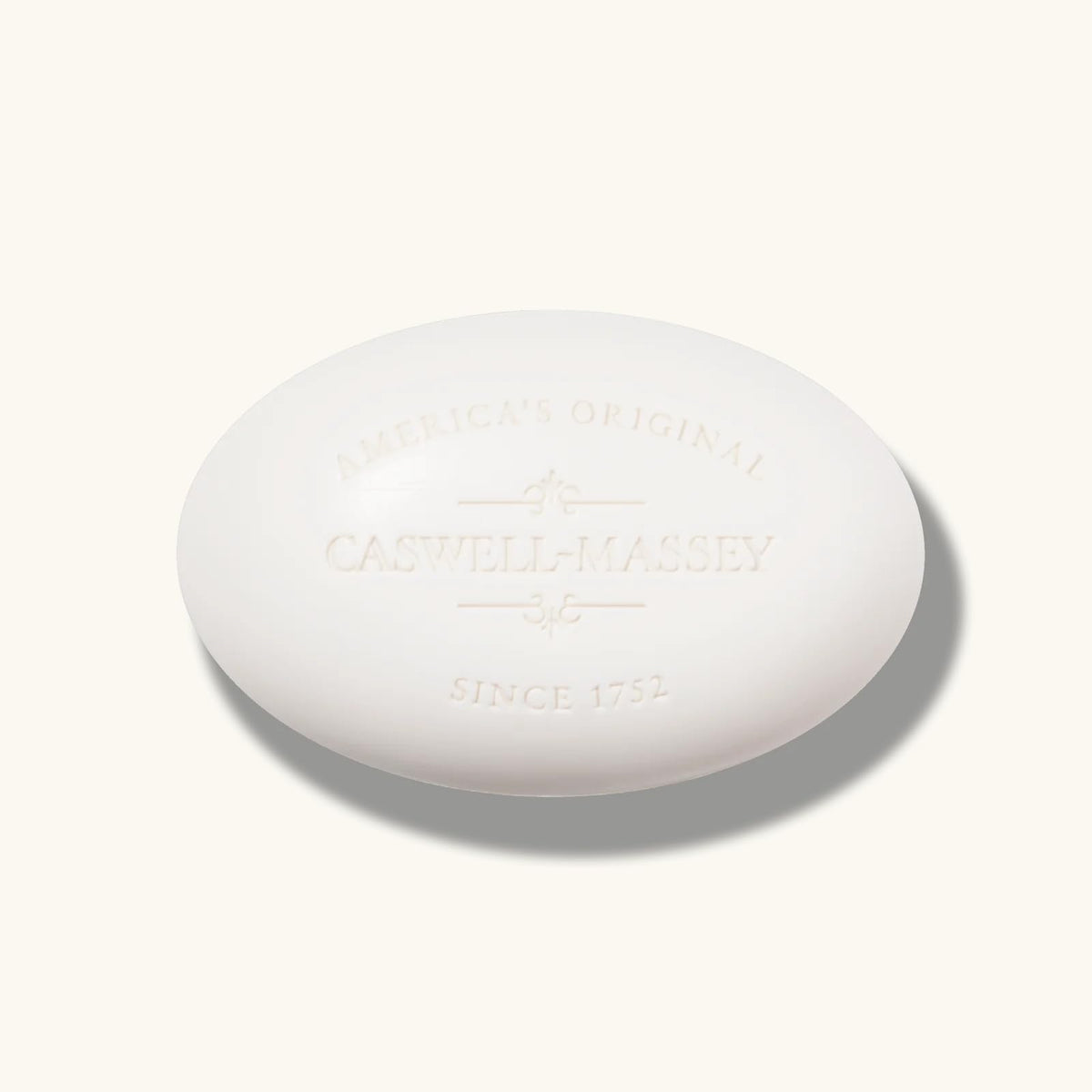 Caswell-Massey three almond bars stacked to show uniform shape and long-lasting use