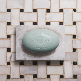 Caswell-Massey close-up of soap texture showing triple-milled density and smooth finish