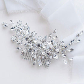 Catery front view of silver bridal hair comb showing flower design and sparkle benefits