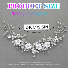 Catery hair vine worn on bride updo illustrating elegant finished look