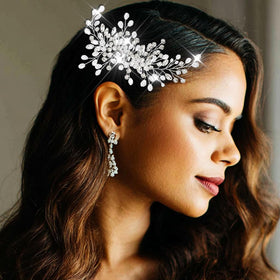 Catery comb held in hand showing compact size and lightweight feel