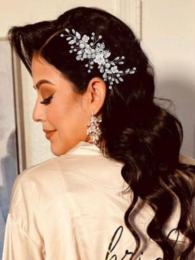 Catery front view of silver rhinestone hair clip, elegant bridal accent