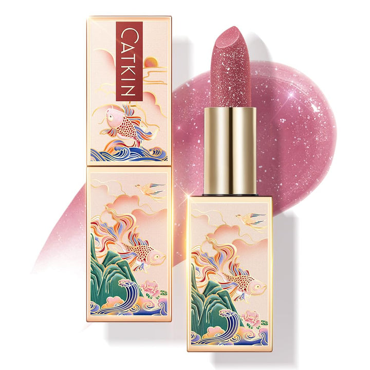 Catkin front packaging showing plum tinted balm and couture case benefit: portable elegance