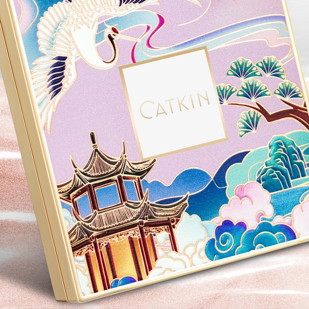 CATKIN compact beside a coin to show 10g size and travel-friendly convenience