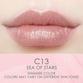 Catkin close-up of balm texture highlighting silky pearl finish and nourishment
