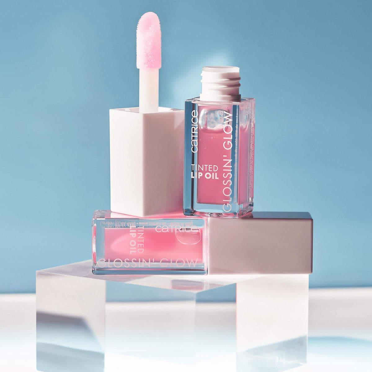 Catrice clear glitter gloss over lipstick creating festive sparkle and dimensional shine benefit