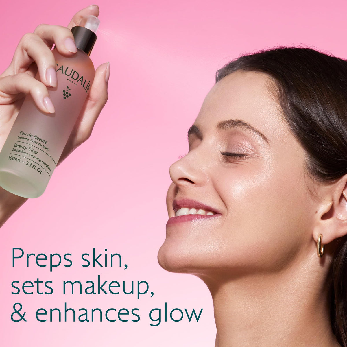 Caudalie mist spraying closeup demonstrating fine even hydration benefit