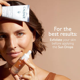 Caudalie bottle on bathroom shelf lifestyle shot showing daily-routine compatibility benefit