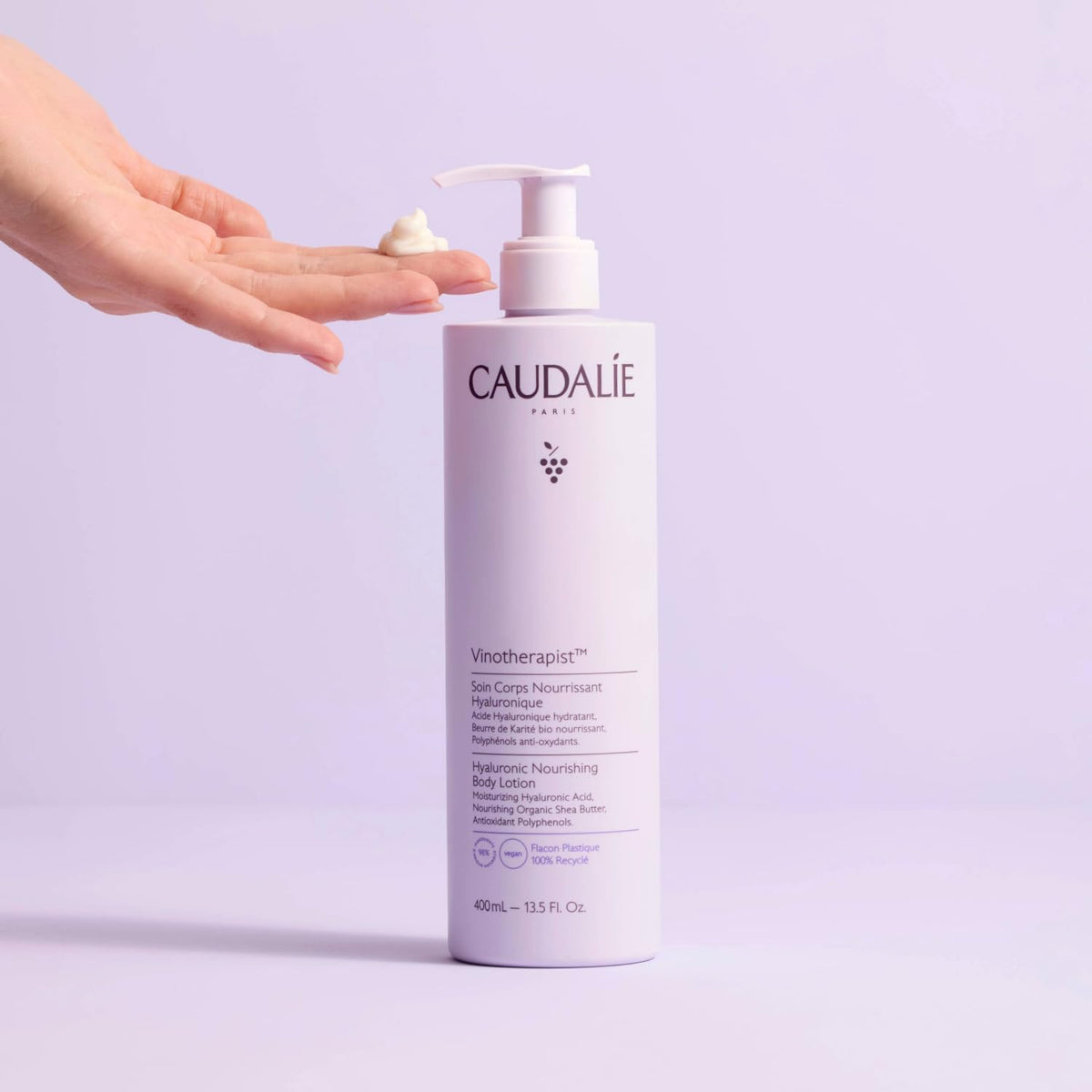 Caudalie applying lotion to legs showing visible softening and hydration benefit