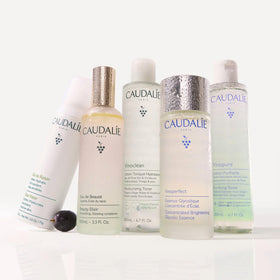 Caudalie toner staged on bathroom vanity to show everyday use and routine convenience
