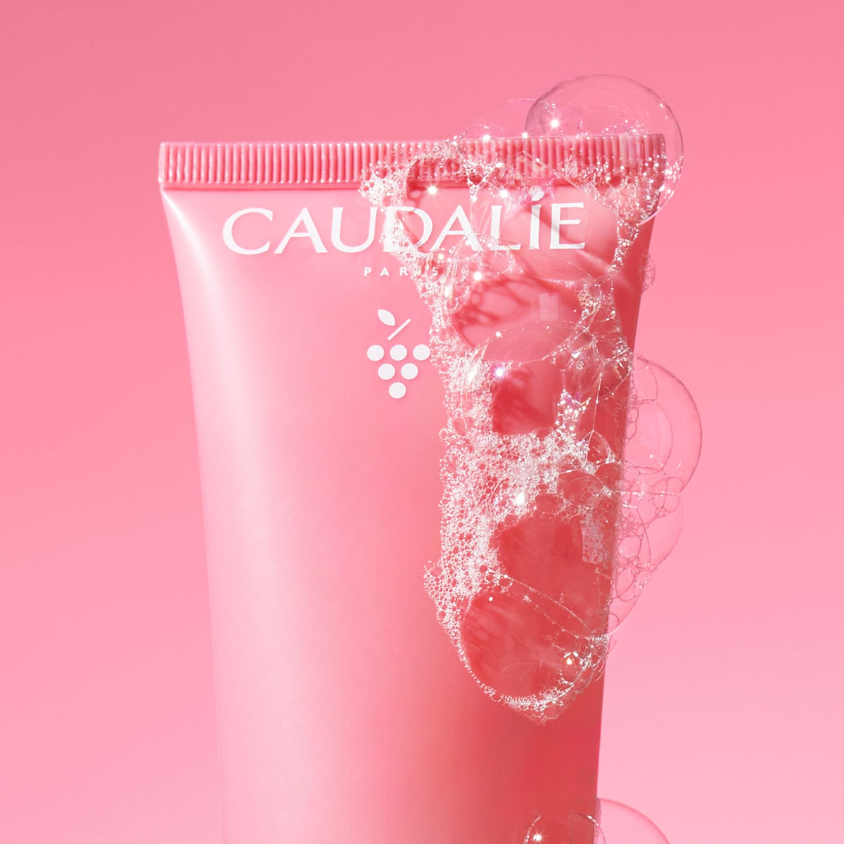 Model using Caudalie cleanser showing comfortable, non-drying cleanse