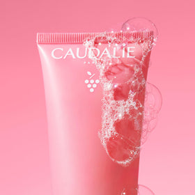 Model using Caudalie cleanser showing comfortable, non-drying cleanse