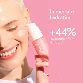 Caudalie VinoHydra serum in hand illustrating easy application and fast absorption