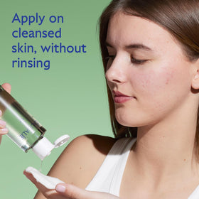 Caudalie Vinopure pouring into hands showing easy application and gentle exfoliation