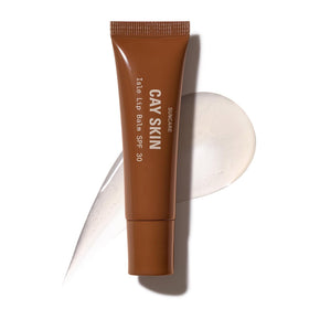 Cay Skin front packaging showing clear glossy lip balm and SPF benefit