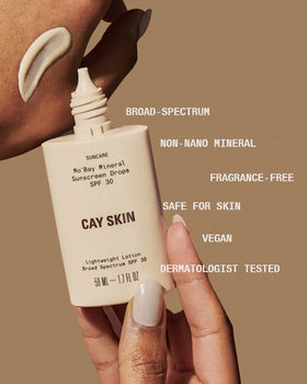 Cay Skin bottle scale next to ruler showing 1.7 oz travel-friendly size