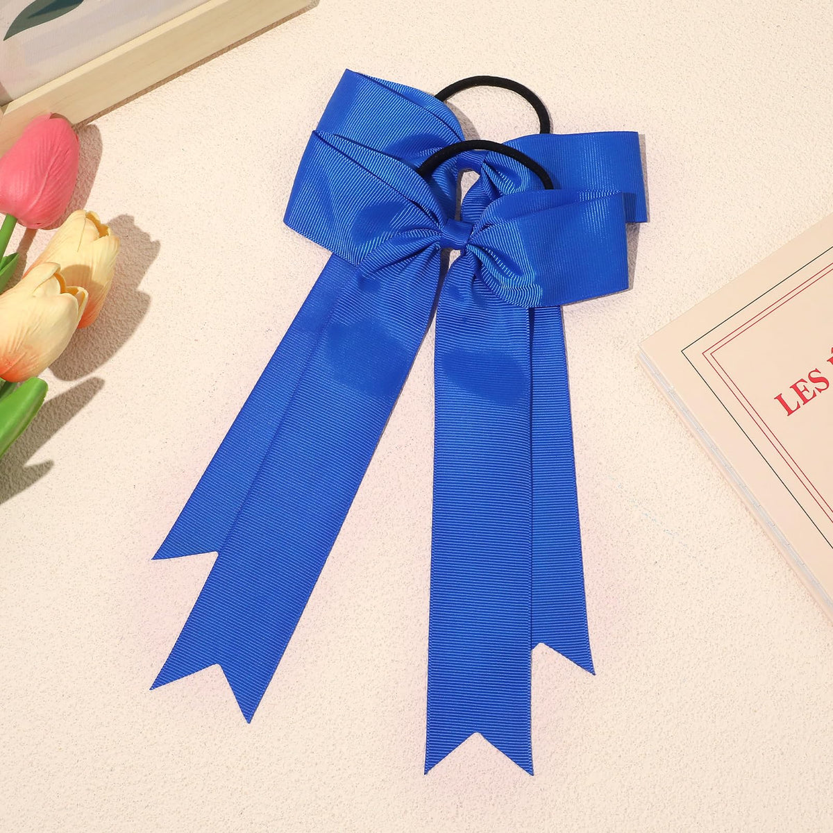 CEELGON bow worn in ponytail during jump for stable performance hold