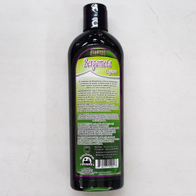 Centro Herbolario pump dispensing shampoo texture, illustrating rich lather and smoothing benefit