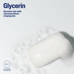 Cetaphil lathering bar in hand demonstrating mild foaming and softness