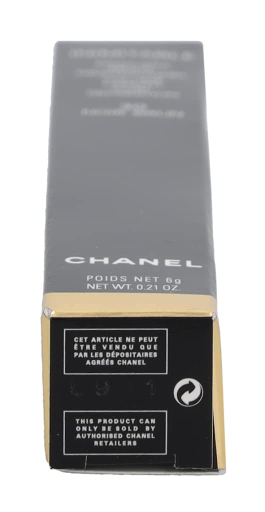 CHANEL mascara next to compact for scale and travel-ready convenience