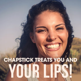 ChapStick cherry tube in hand showing portable hydration on-the-go