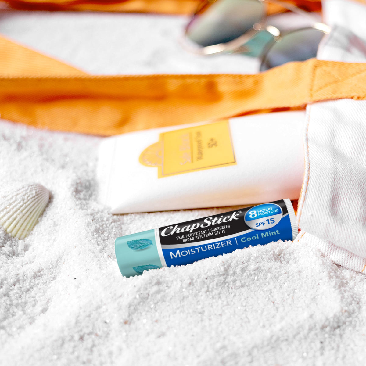 ChapStick placed in beach bag illustrating sun-ready protection benefit