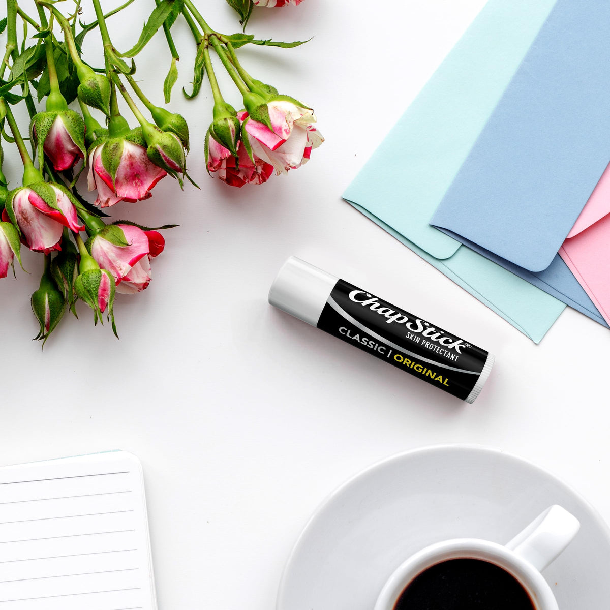 chapstick stick in hand showing size and pocket-friendly portability
