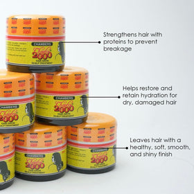 Applying Chapter 2000 to scalp with fingers demonstrating targeted hydration and scalp comfort