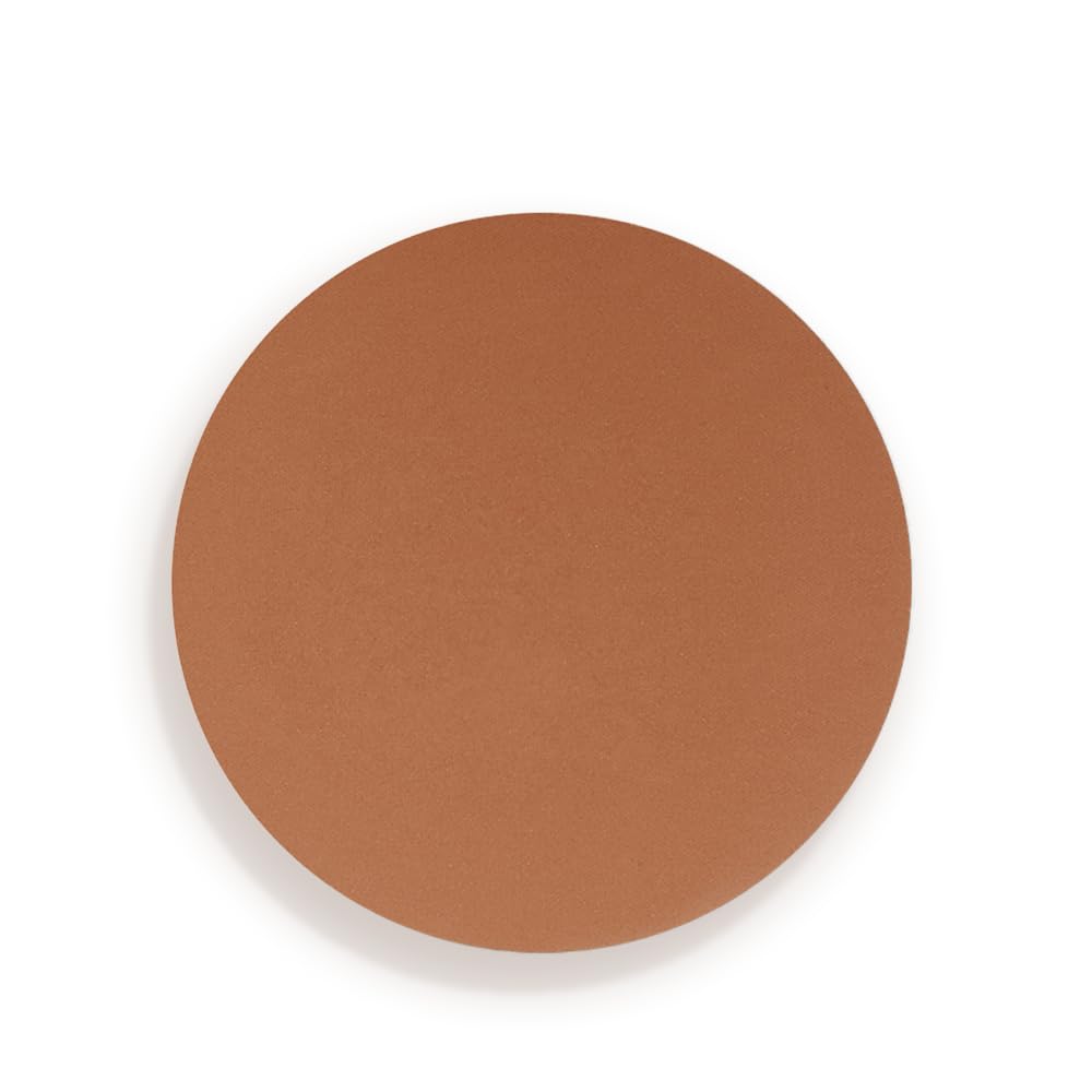 Charlotte Tilbury compact in hand showing size and travel-friendly convenience benefit