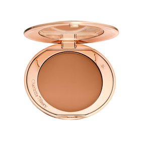 Charlotte Tilbury compact front view showing sleek packaging and shade for easy identification