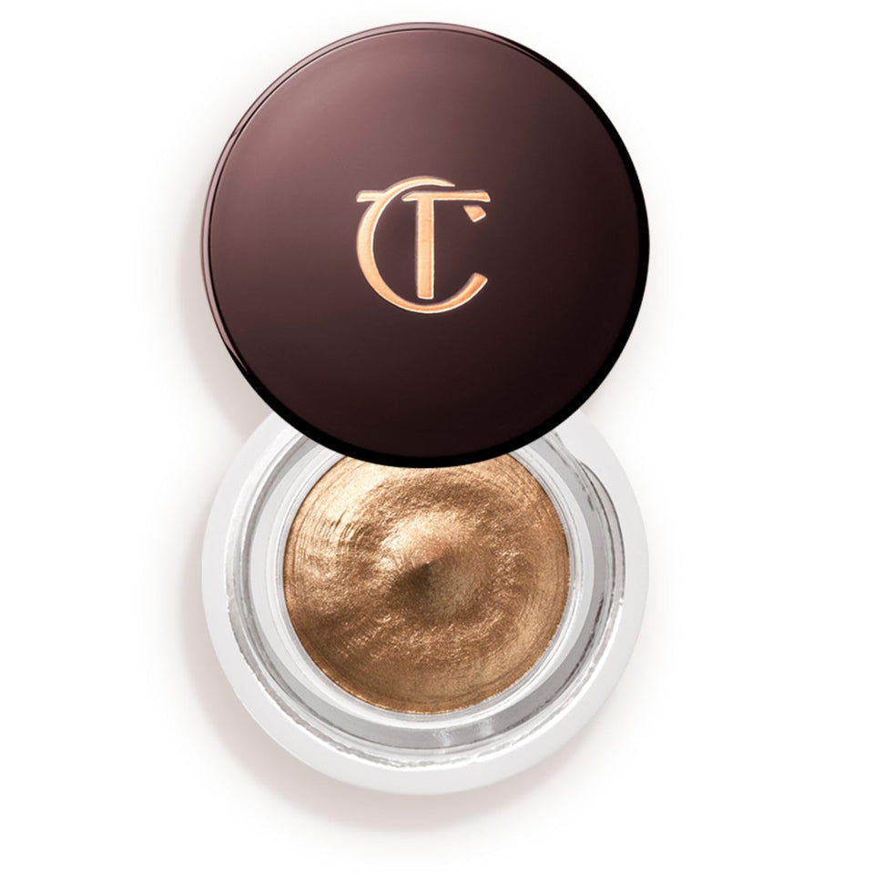 Charlotte Tilbury pot front view showing Amber Gold and elegant packaging benefit instant radiance