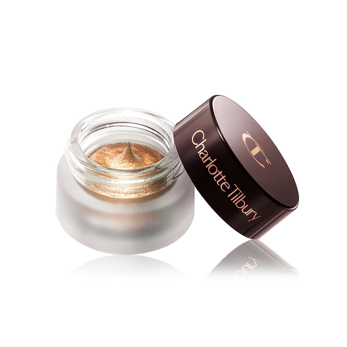 Charlotte Tilbury product in a makeup bag lifestyle shot showing travel-friendly compact and day-to-night use benefit