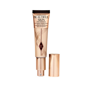 Charlotte Tilbury front packaging showing elegant bottle and glow benefit