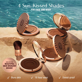 Charlotte Tilbury bronzer blended on collarbone, illustrates full-body glow potential